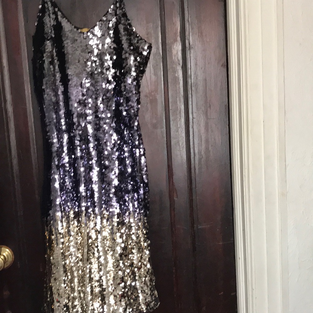 18. New with tags, colored sequined dress.